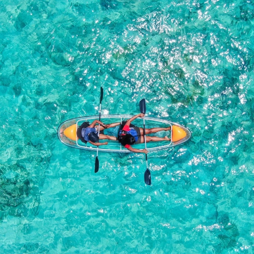 Adventure Awaits: Crystal Clear Kayak and Inflatable Sprinkler Pool