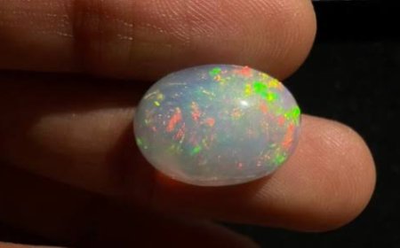 The Magic of Welo Opals: A Deep Dive into the 12.00 Ct White Ethiopian Opal Cabochon